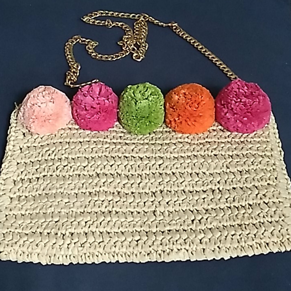 Women's purse with gold chain strap